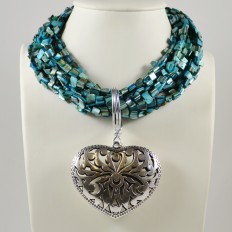 Turquoise mother of pearl multistrand with large silver plated heart