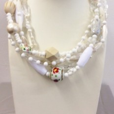 White multistrand with a variety of beads