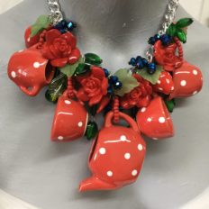 Red polka dot ‘flying’ tea pot necklace £125 NOW £75