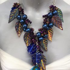 Eclectic necklace with leaves in blues and purples £75 NOW £35