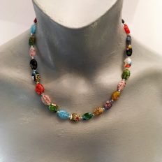Millefiori glass oval beads £25