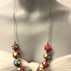Bright red glass with silver foil detail, necklace with chain – £45 NOW £25